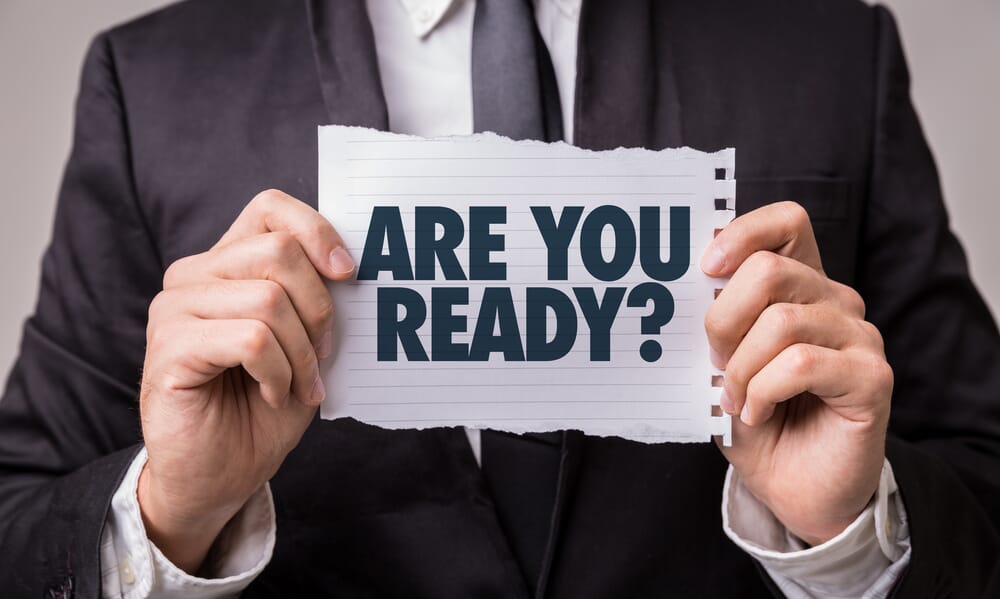 ARe-you-ready-man-holding-sign